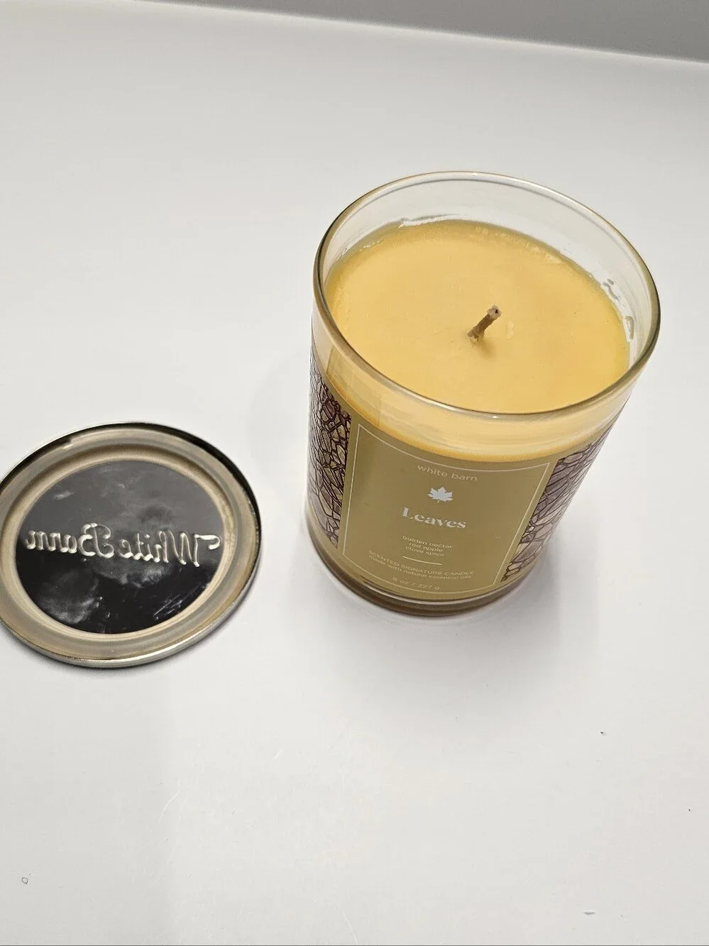 Bath & Body Works White Barn Leaves scented 8 Oz candle New